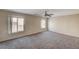 Expansive bedroom featuring neutral walls, carpet and windows at 3349 Morning Amber St, North Las Vegas, NV 89032