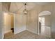 Dining area with modern lighting, tile flooring, and convenient access to the adjacent rooms at 3349 Morning Amber St, North Las Vegas, NV 89032