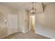Entryway with tile flooring, neutral walls, and access to multiple rooms at 3349 Morning Amber St, North Las Vegas, NV 89032
