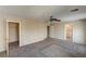 Spacious main bedroom showcasing an ensuite bathroom, walk-in closet and carpeted floors at 3349 Morning Amber St, North Las Vegas, NV 89032