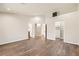 Large bedroom features hardwood floors, multiple doors and access to closet at 3709 Ferrell St, North Las Vegas, NV 89032