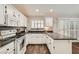 Charming kitchen has white cabinets, granite countertops and stainless steel appliances at 3709 Ferrell St, North Las Vegas, NV 89032