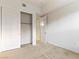 Bedroom with carpet, closet and door to another room at 38 E Serene Ave # 134, Las Vegas, NV 89123