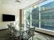 Conference room with a large window and modern furniture at 38 E Serene Ave # 134, Las Vegas, NV 89123