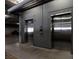 Elevators provide access to residential floors from the parking garage at Manhattan Condominiums at 38 E Serene Ave # 134, Las Vegas, NV 89123