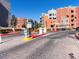 Community entrance featuring automatic gates and beautifully landscaped surroundings at 38 E Serene Ave # 134, Las Vegas, NV 89123