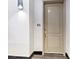 Interior view of an apartment door with a unit number, showcasing a clean and modern entryway at 38 E Serene Ave # 134, Las Vegas, NV 89123