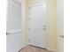 Interior entryway featuring a closet and a clean, modern door leading to the main living space at 38 E Serene Ave # 134, Las Vegas, NV 89123
