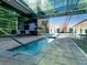 Hot tub with a glass building in background at Manhattan Condominiums at 38 E Serene Ave # 134, Las Vegas, NV 89123