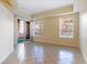 Bright living room with large windows, sliding glass door to balcony and neutral wall color at 38 E Serene Ave # 134, Las Vegas, NV 89123