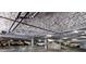 Spacious parking garage with ample lighting for residents at Manhattan Condominiums at 38 E Serene Ave # 134, Las Vegas, NV 89123