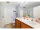 Double vanity bathroom with a large shower and soaking tub at 4350 New Suffolk St # 1, North Las Vegas, NV 89032