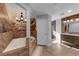 Spa-like bathroom with a large tub and double vanity at 4361 Verona Ave, Las Vegas, NV 89120