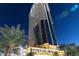 Night view of Palms Place highrise building, modern architecture, city lights at 4381 W Flamingo Rd # 2903, Las Vegas, NV 89103