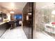 Modern open concept layout showcasing the kitchen, bathroom, bedroom, and living area at 4381 W Flamingo Rd # 2903, Las Vegas, NV 89103