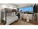 Bedroom with bunk bed, workspace and city views at 4471 Dean Matin Dr # 1210, Las Vegas, NV 89103