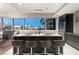 Modern kitchen with island, stainless steel appliances, and city views at 4471 Dean Matin Dr # 1210, Las Vegas, NV 89103