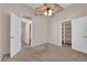 Bedroom with ceiling fan and built-in shelving at 4509 Crimson Leaf Dr, Las Vegas, NV 89130