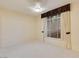 Bright bedroom with large window and neutral decor at 4649 Bird View Ct, Las Vegas, NV 89129