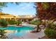 Stunning pool and spa surrounded by lush landscaping at 4649 Bird View Ct, Las Vegas, NV 89129