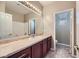 Bathroom with granite countertop and double sink vanity at 4750 Fiore Bella Blvd, Las Vegas, NV 89135