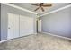 Spacious bedroom with tiled floors and large closet at 4750 Fiore Bella Blvd, Las Vegas, NV 89135