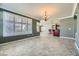 Spacious dining room with tile floors and view to kitchen at 4750 Fiore Bella Blvd, Las Vegas, NV 89135