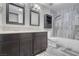 Clean bathroom, double vanity, and updated shower at 4857 Fairfax Ave, Las Vegas, NV 89120