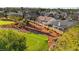 Aerial view of home with solar panels near a golf course at 5009 Elm Grove Dr, Las Vegas, NV 89130