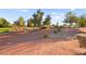 Landscaped community area with trees and pathways at 5009 Elm Grove Dr, Las Vegas, NV 89130