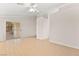 Bright living room with tile floors and sliding glass doors leading to the patio at 5009 Elm Grove Dr, Las Vegas, NV 89130