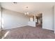 Bright dining room with neutral walls and carpet at 5555 Sun Temple Ave, Las Vegas, NV 89139