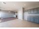 Modern kitchen with gray cabinets and stainless steel appliances at 5555 Sun Temple Ave, Las Vegas, NV 89139