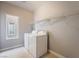 Laundry room with washer, dryer, shelving and window at 5555 Sun Temple Ave, Las Vegas, NV 89139