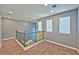 Spacious loft area with gray walls and carpet at 5555 Sun Temple Ave, Las Vegas, NV 89139