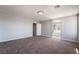 Main bedroom with carpet and an ensuite bathroom at 5555 Sun Temple Ave, Las Vegas, NV 89139