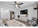 Bright bedroom with a queen-size bed and plenty of storage at 6318 Amber Sunrise St, North Las Vegas, NV 89031