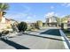 Gated community entrance with landscaping and signage at 6318 Amber Sunrise St, North Las Vegas, NV 89031