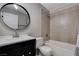 Bathroom with tiled shower, vanity, and bathtub at 6657 W Tropicana Ave # 201, Las Vegas, NV 89103