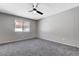 Large bedroom with ceiling fan and plenty of natural light at 6657 W Tropicana Ave # 201, Las Vegas, NV 89103