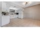 Well-equipped kitchen with white cabinets and modern appliances at 6657 W Tropicana Ave # 201, Las Vegas, NV 89103