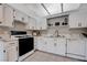 Updated kitchen boasting white cabinets and granite countertops at 6657 W Tropicana Ave # 201, Las Vegas, NV 89103