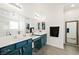 Elegant bathroom with dual vanities and a large mirror at 6955 Sunrise Crest Dr, Las Vegas, NV 89142
