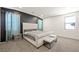 Main bedroom with upholstered bed and neutral decor at 6955 Sunrise Crest Dr, Las Vegas, NV 89142