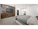 Bright bedroom with a comfortable bed and a modern wall accent at 6955 Sunrise Crest Dr, Las Vegas, NV 89142