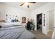 Bright bedroom with a double bed, desk, and spacious closet at 6955 Sunrise Crest Dr, Las Vegas, NV 89142