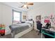 Stylish bedroom with a queen bed and a desk setup at 6955 Sunrise Crest Dr, Las Vegas, NV 89142