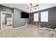 Spacious bonus room with ceiling fan and plenty of shelving at 6955 Sunrise Crest Dr, Las Vegas, NV 89142
