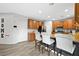Modern kitchen with wood cabinets and granite countertops at 6955 Sunrise Crest Dr, Las Vegas, NV 89142