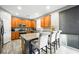 Modern kitchen with wood cabinets and granite countertops at 6955 Sunrise Crest Dr, Las Vegas, NV 89142